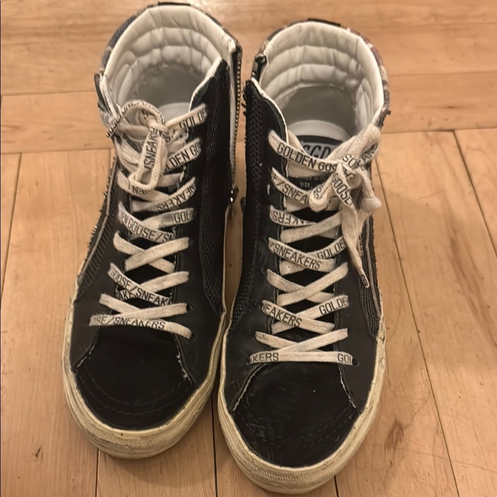 Golden Goose Black and White High-Top Sneakers